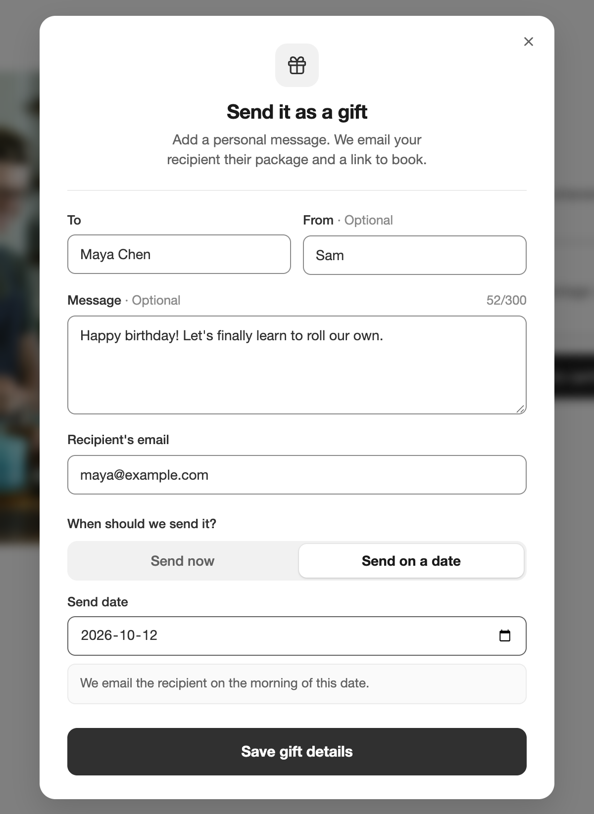 The Send it as a gift window on a product page, with To "Maya Chen", From "Sam", a birthday message, the recipient's email, "Send on a date" selected and a send date of October 12, 2026, above a Save gift details button